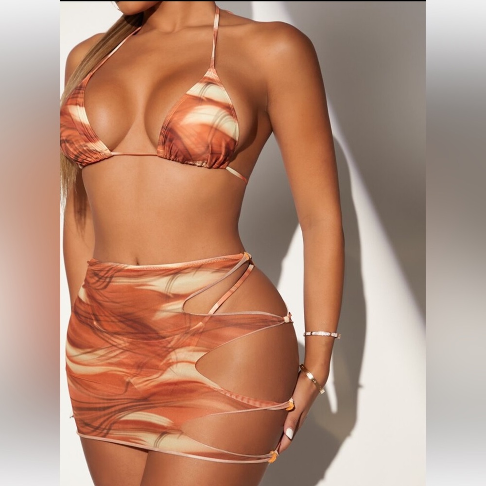BRAND NEW. NEVER WORN 3 PIECE BIKINI SET